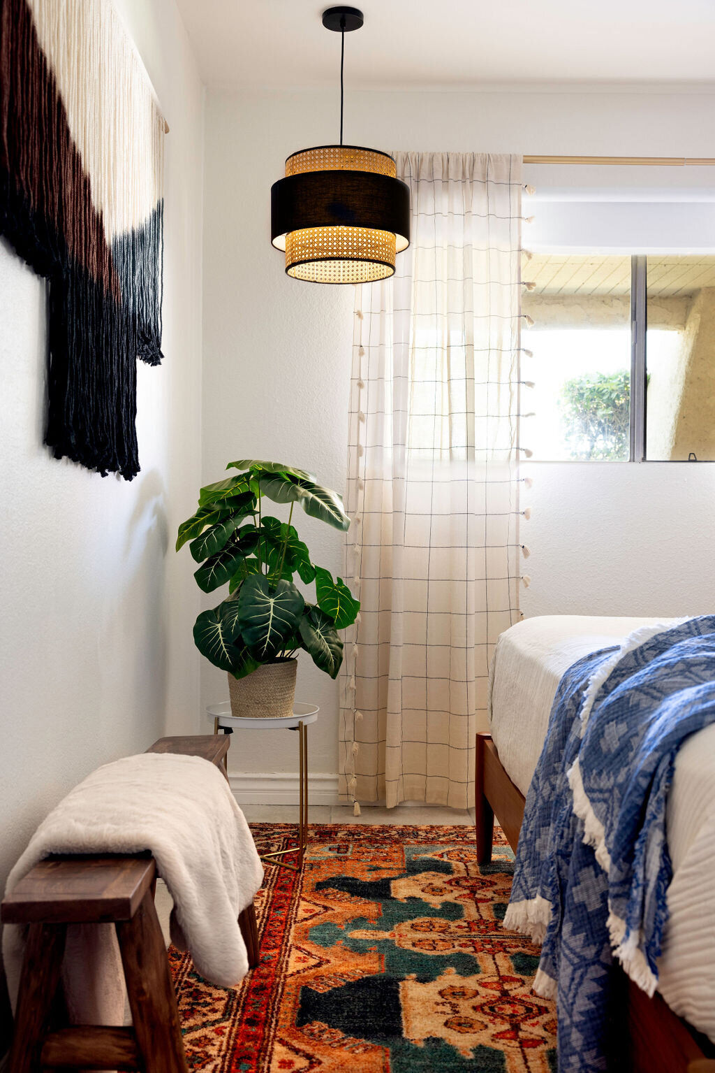 Bathroom with modern fixtures and sage accents